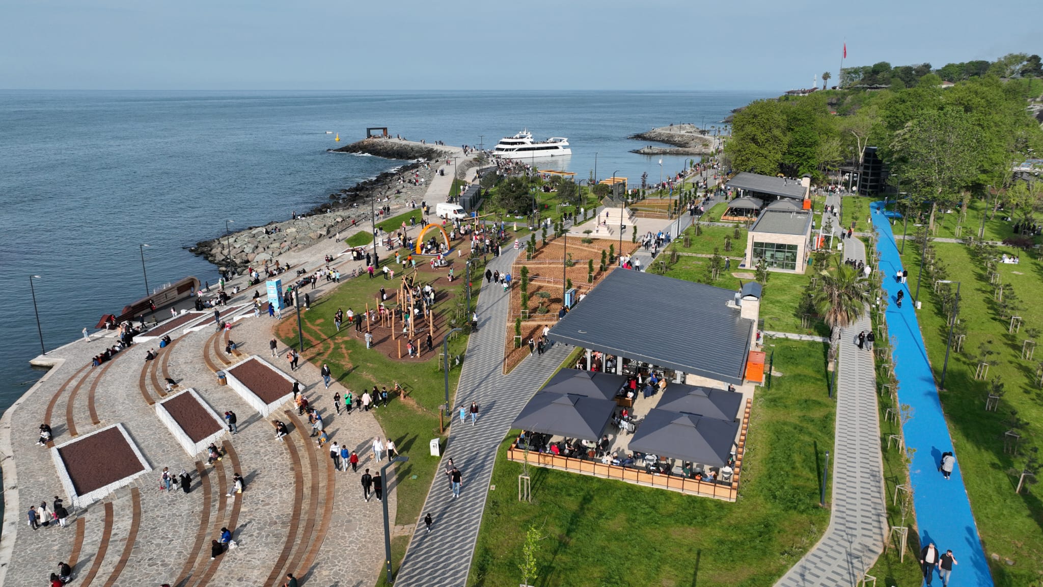 Colorful market stalls and shoppers at Ortahisar Bazaar