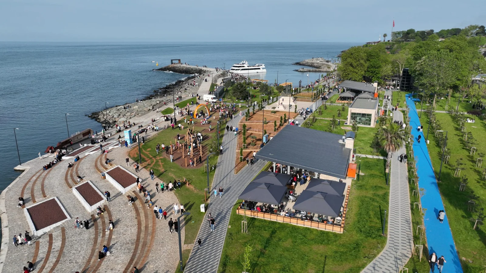 Colorful market stalls and shoppers at Ortahisar Bazaar